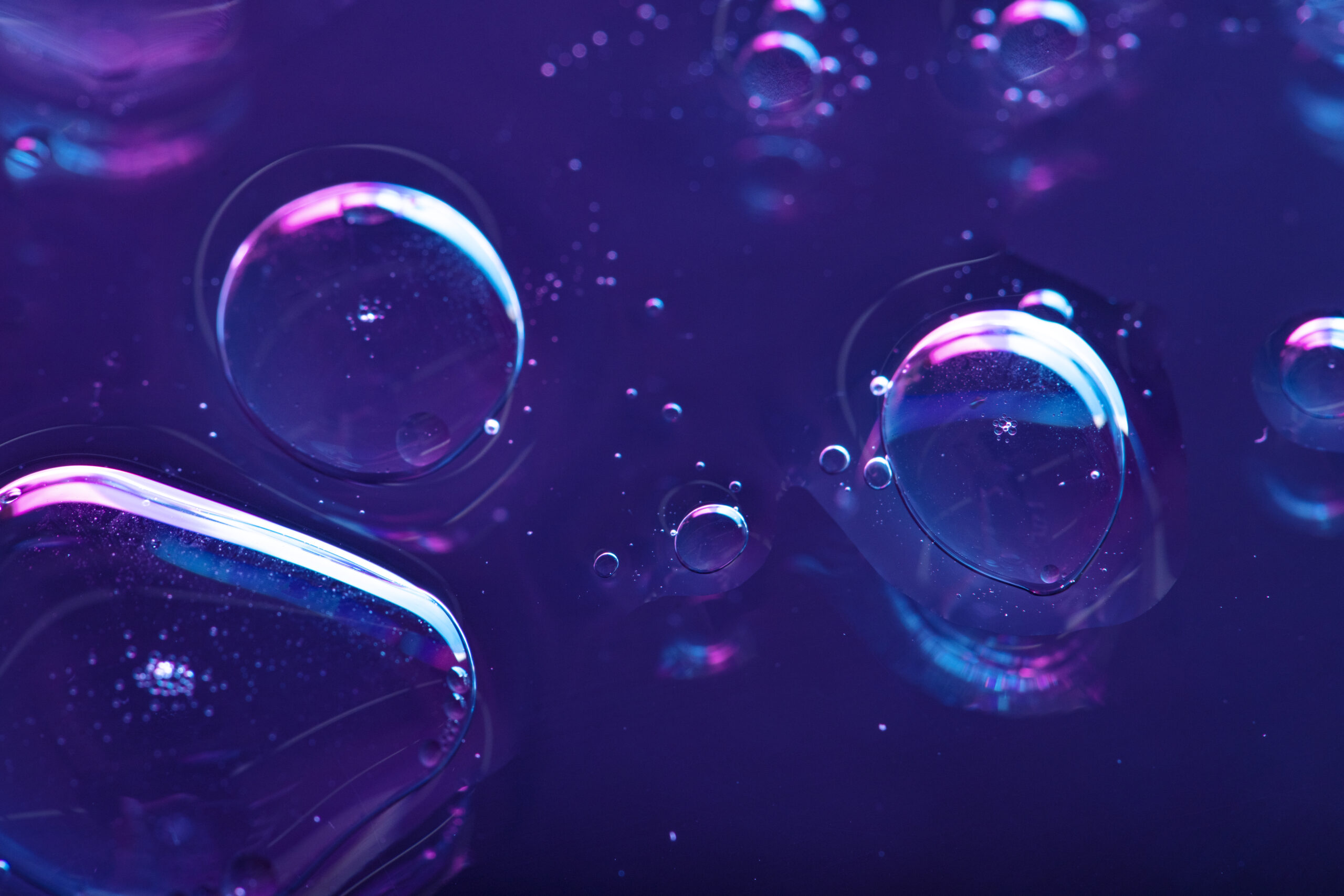 Vibrant neon purple liquid background